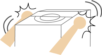 洗濯機をつかむ