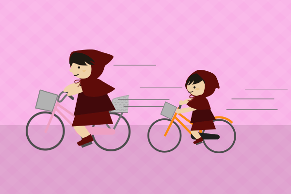 自転車に乗る親子